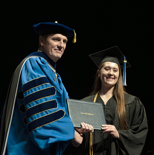 Student receiving diploma